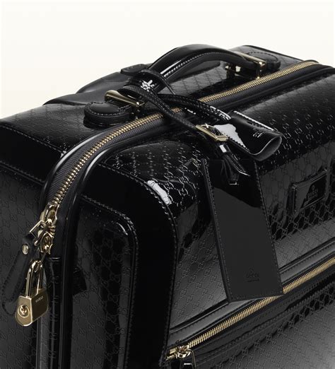 giacca gucci m|Gucci leather suitcase.